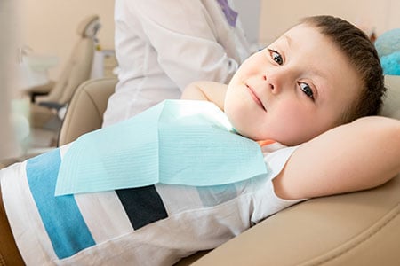 relaxed child in dental chair